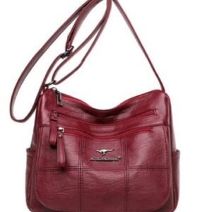 BOLSA FEMININA TIPO TRANSVERSAL OU TIRACOLO, DESTINADA AO TRANSPORTE DE OBJETOS DE USO PESSOAL